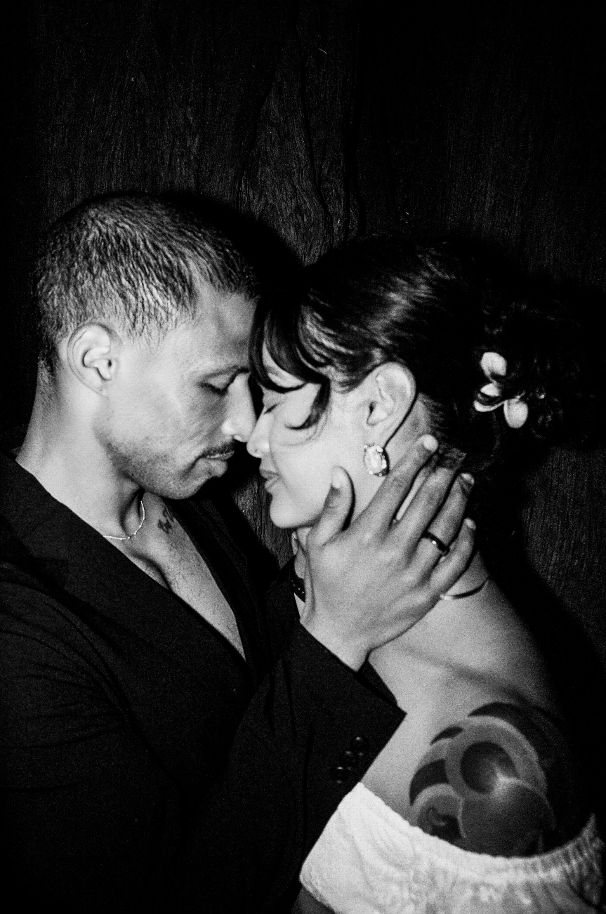 A couple embracing in black and white