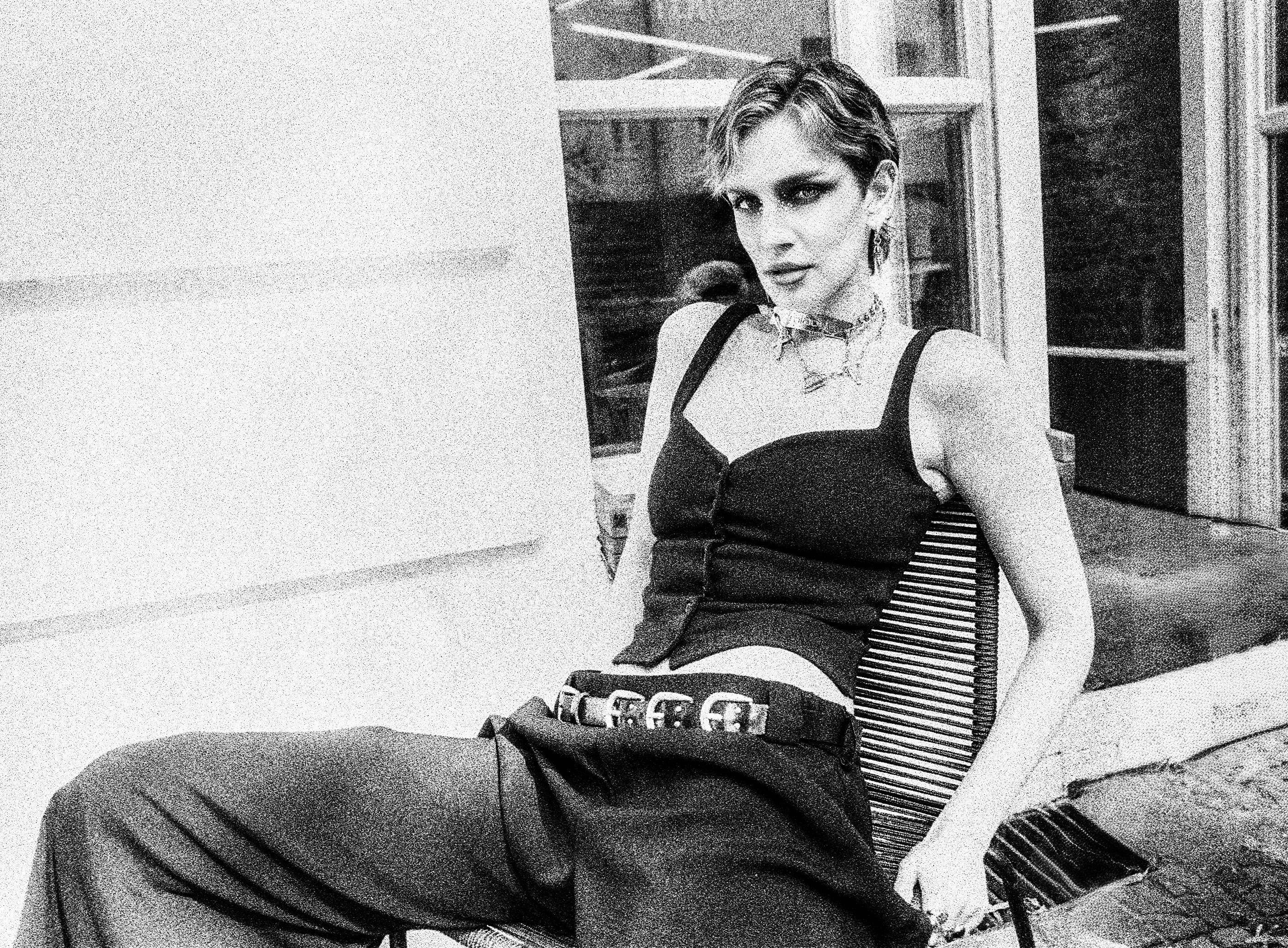 Seated fashion portrait in high-grain black and white